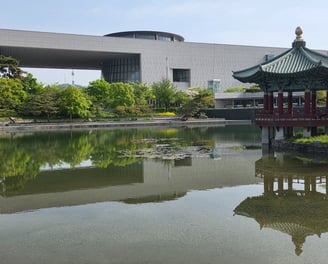 View of the museum, pond and pagoda
