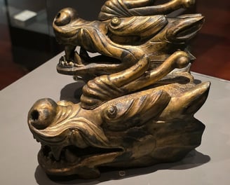 Bronze dragon head statues
