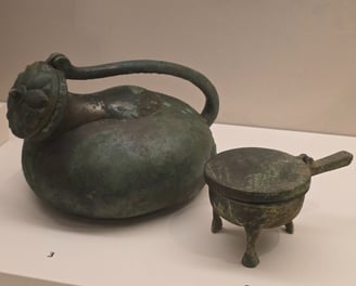 Bronze tripod cauldrons