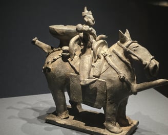 Horse and rider pottery
