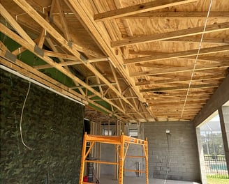 Porch rebuild by FC Innovations with new support columns, wood joists, and foundation work in Florid