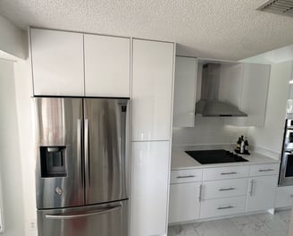 Complete kitchen renovation in Kissimmee featuring new cabinetry, tile flooring, and layout optimiza