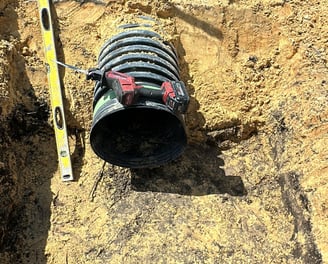 Complete driveway construction in Kissimmee, Florida featuring compacted base, rebar reinforcement,
