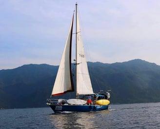 a sailboat sailing on the water