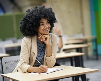 a happy maths student that is happy after reading the chimhanda tutoring guide