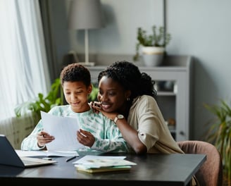 Happy mother after reading the chimhanda tutoring guide on how to help your child