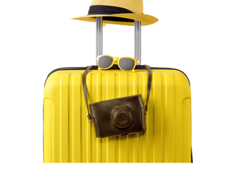 a hat and sunglasses on a suitcase