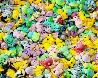 a mountain of miniature collectable toys