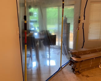 protection des lieux contre la poussière lors du démolition 