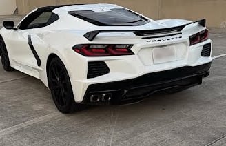 Rear view of 2023 Corvette 3LT with white paint and black trim