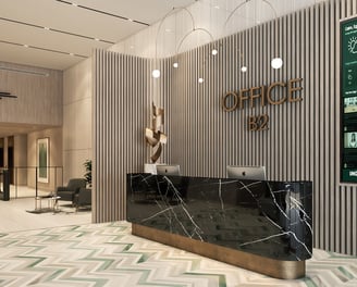 Elegant reception area in a premium office building at One Ninety, featuring warm textures