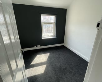 Freshly decorated room by Venom Property Maintenance in Hull, featuring clean lines, smooth finishes
