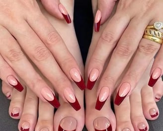 a woman's feet with a ring on her finger
