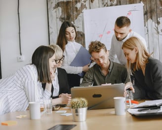 Taritan Solutions team collaborating with corporate client on staffing needs