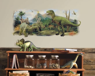 a shelf with a dinosaur and a shelf with books