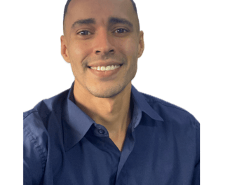 a man in a blue shirt and tie dye on his shirt