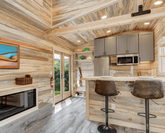 Rustic kitchen interior of modern tiny home on wheels