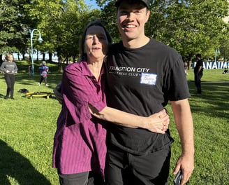 dustin king and his mom hugging in the wellness park