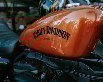 Orange Harley Davidson Fuel Tank with Black Logo at ProPolish