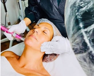 a woman getting a facial lift in a beauty salon