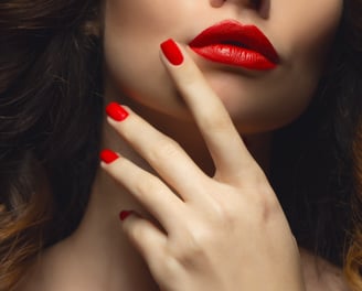 a woman with red lipstick and red lipstick