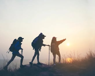 Group of people hiking to enhance physical health and enjoy nature