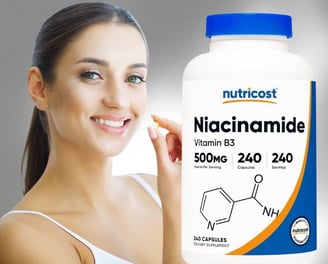 a woman holding a bottle of vitamin supplements