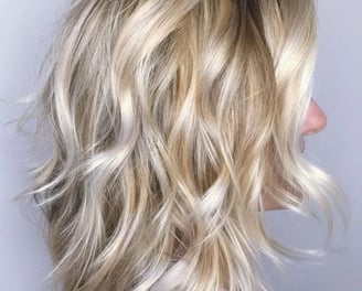 woman with blonde wavy hair
