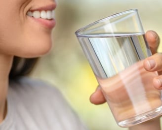 woman on diet drinking water