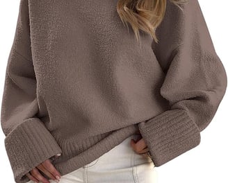 a woman wearing a brown sweater and cream pants, fall outfits, sweater, fall fashion