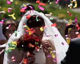 Bride with colourful confetti