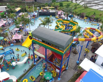 a water park with a water slider and a water slider