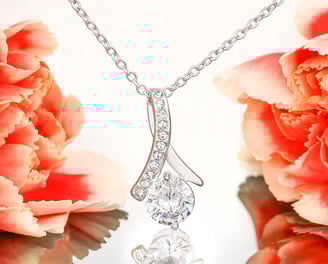 a diamond pendant necklace with a diamond pendant