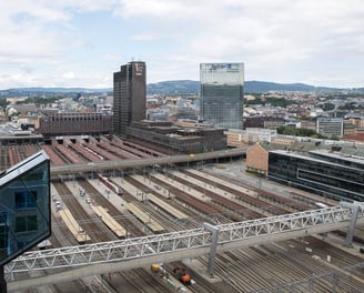 a train station with a train on the tracks
