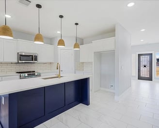 a kitchen with a large island