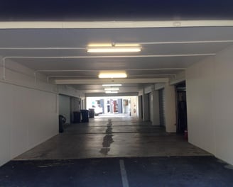 a parking lot with a parking lot and a parking lot