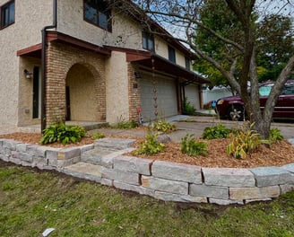 mulch-with-rock-retaining-wall.jpg