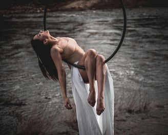 a woman on an aerial hoop