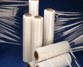 a bunch of plastic wrappers on a blue background