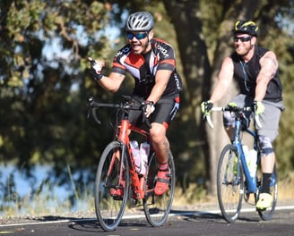 Two men cycling in the outdoors