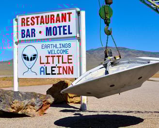 a ufo sitting on the side of a road