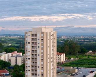a tall building with a clock tower in the middle of it