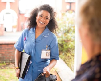 physiotherapy at home for seniors - a physiotherapist arriving for a physiotherapy home visit