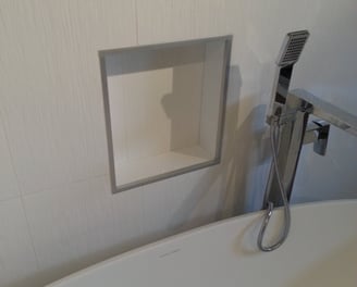 bathroom tiled tub