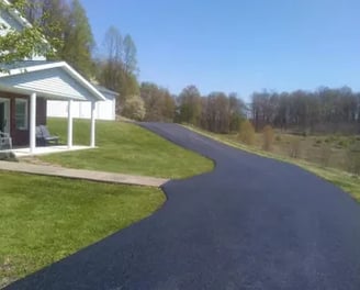 Residential asphalt driveway paving in West Virginia – smooth, durable, and long-lasting.