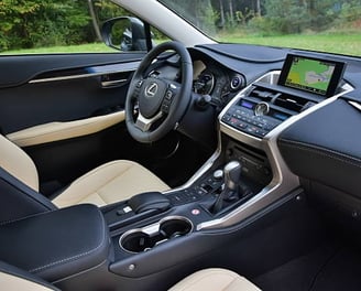 a car dashboard with a steering wheel and dashboard