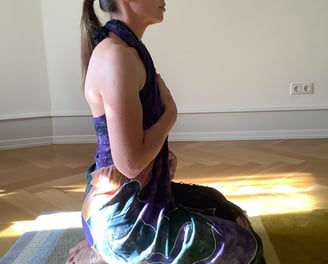 woman sitting in meditation