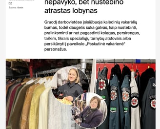 Two women showing different clothes, they are at costume rental warehouse