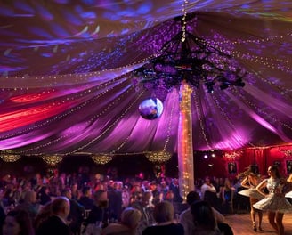 An image of a crowd watching a traditional ceilidh