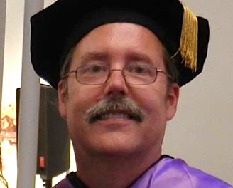Image of Craig Chalquist in regalia.